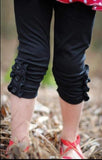 Black Ruffle Button Capris