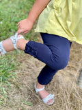 Navy Ruffle Button Capris