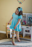 Vibrant Pastels Rainbow Stripe Ruffle Button Leggings